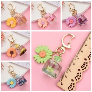 Simulated Perfume Bottle Moon Buckle Chrysanthemum Keychain Hanging Pendant - Picture 1 of 12
