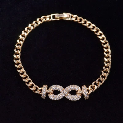 Brazalete símbolo infinito topacio transparente de moda relleno de oro amarillo de 18 quilates para mujer Foto 1 de 2