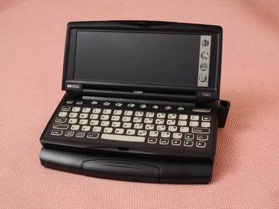 PC Hewlett Packard HP 620LX Palmtop Modelo F1250A Sin batería con base sin probar Foto 1 de 4