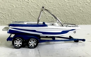 JOHNNY LIGHTNING 1:64 SPORT FISHING BOAT WITH TRAILER NEW FROM PACKAGE~! - Picture 1 of 8