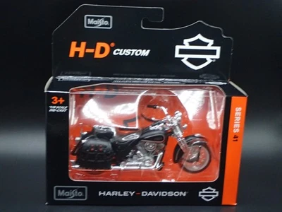 Motocicleta Harley Davidson 1999 FLSTS Heritage Softail Springer Maisto 41 1/18 Foto 1 de 4