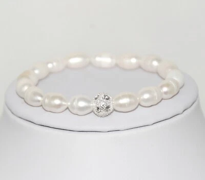 Süßwasser-Natur-Perlen-Armband 17 bis 24 cm mit Gummizug 1 Stück Neu Creme-Weiß - Bild 1 von 2