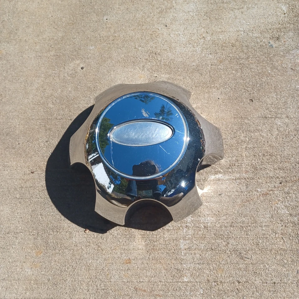 Tapa central Ford F150, cromo, 2009-2014 parte # 9L34 1A096 FB 03 logotipo descolorido Foto 1 de 3