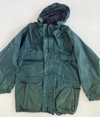 Chaqueta cortavientos Helly Hansen para hombre M verde tecnología empaquetable resistente al viento y la lluvia Foto 1 de 4