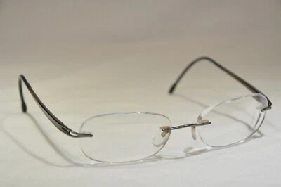 Monturas de gafas Silhouette 7622 6061 gris titanio marrón sin montura 135 Foto 1 de 4