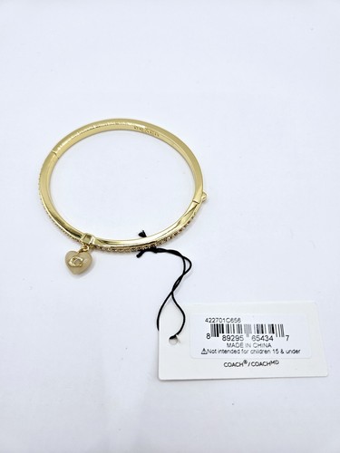 Bracciale Coach tono oro pendente cuore ciondolo nuovo