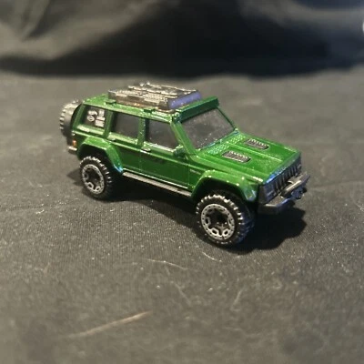 2022 Hot Wheels dark green '95 JEEP CHEROKEE 150/250 new model BAJA BLAZERS - Image 1 of 4