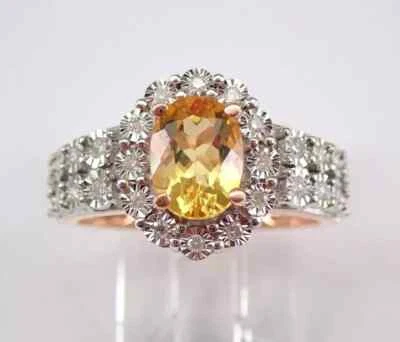 Anillo de compromiso ovalado de halo de citrino amarillo creado en laboratorio de 2,20 quilates enchapado en oro rosa de 14 quilates Foto 1 de 4