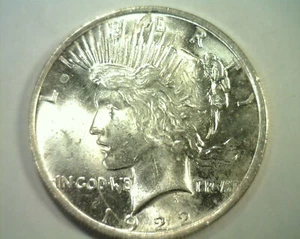 1922 PEACE SILVER DOLLAR COOL LAMINATION ON OBVERSE NICE UNCIRCULATED NICE UNC. - Picture 1 of 3