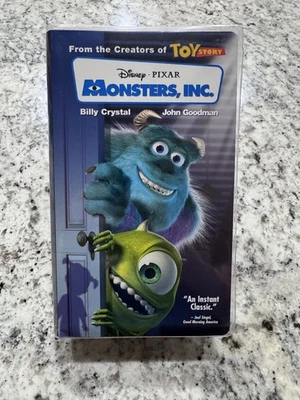 Monsters, Inc. (VHS, 2002) Disney Pixar Clear Clam Shell Case & Blue Tape Foto 1 de 2