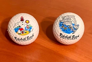 Two (2) Rehoboth Beach Delaware Lighthouse & Dolphins Logo Golf Balls - Picture 1 of 3