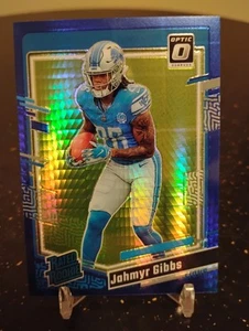 2023 Panini Donruss Optic - Rated Rookie Jahmyr Gibbs #236 Blue Hyper Prizm (RC) - Picture 1 of 2
