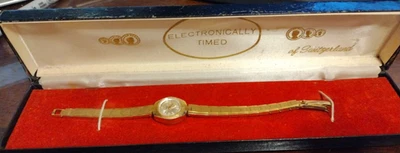 Lady Nelson Thin Ladies Watch SWISS Made BASE METAL Gold Tone Work Silver Back  - Image 1 of 4