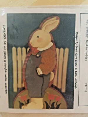 BUNNY NAPKIN HOLDER CAROL MCNAUGHT 1987 SANDI EVANS PAINTING PATTERN ROOTS WINGS - Image 1 of 2
