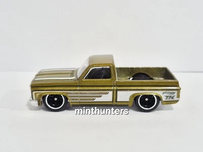 Chevy Silverado 2014 Super Treasure Hunt '83 dorado suelto Hot Wheels Foto 1 de 4