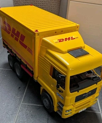bruder MAN TGA DHL Logistik-LKW mit Mitnahmestapler - Bild 1 von 4
