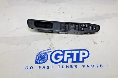 05-07 SUBARU WRX STI OEM CONDUCTOR PUERTA DELANTERA VENTANA INTERRUPTOR CONTROLES DE MOLDURA Foto 1 de 4