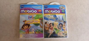 Lot of 2- vtech- Mobigo- Dora the Explorer- Disney fairies- Explore Your Talents - Picture 1 of 2