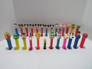 LOTE DE 26 DISPENSADORES PEZ DE COLECCIÓN INCLUYENDO DISNEY, SNOOPY, LISA SIMPSON Y MÁS - Imagen 1 de 18