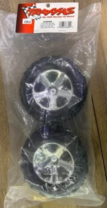 Traxxas® TRA3669  Tires & wheels, assembled, glued (2.8") All-Star chrome wheels - Picture 1 of 2