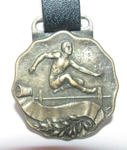 Medaglia fob orologio sportivo olimpico ostacolo pista e campo vintage primi 1915-1928 HTF! - Foto 1 di 1
