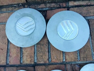 Dos tapas centrales Mercury Sable 1992-1995 F24C-1A096-AA cubiertas de rueda  Foto 1 de 4