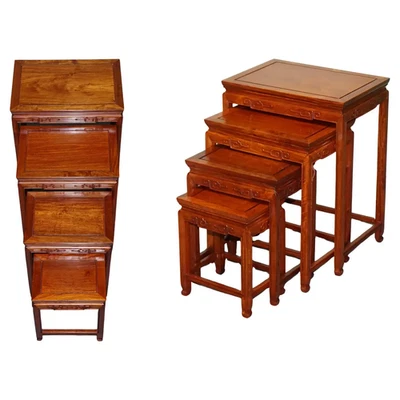 ORIENTAL CHINESE TEAK NEST OF FOUR TABLES WITH CARVED DETAILS - Image 1 of 4