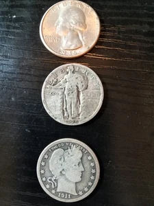3 Quarters: 1935 AU Washington. 1911 Barber Good. 1925 Good. No reserve. - Picture 1 of 8