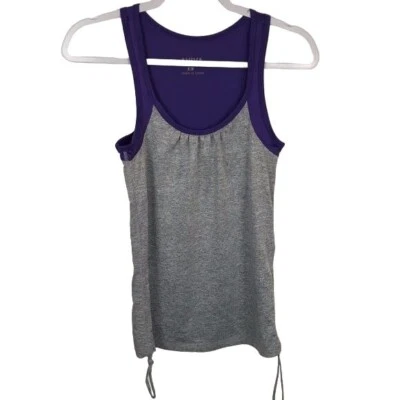 Camiseta sin mangas AVIVA Sport para mujer talla pequeña púrpura gris ajustada con cordones laterales Foto 1 de 4