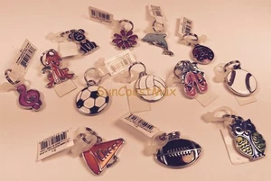 GANZ Niños Novedad Dijes Etiquetas Mochila Cremallera Tirón Flor Deportes Música Mascotas Nuevo con etiquetas - Imagen 1 de 14