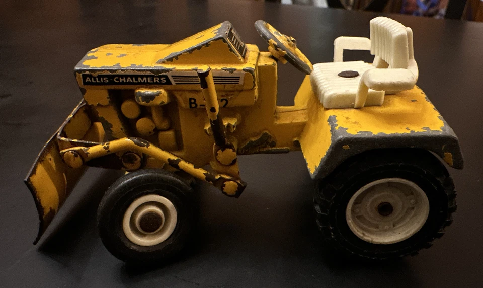 Vintage ERTL Allis-Chalmers 1/16 diecast yellow B-112 tractor, mower, plow Toy - Image 1 of 4