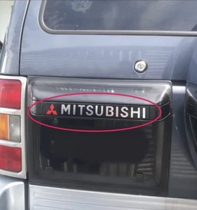 Mitsubishi Pajero V Body LO Wide body emblem reardoor handle logo sign badge - Picture 1 of 4