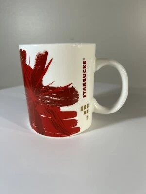 Starbucks Mug White Porcelain Red Starburst Art Dated 2014 Collectible - Image 1 of 3
