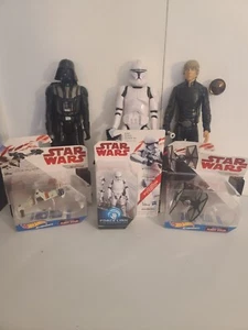 STAR WARS FIGURES AND COLLECTIBLES - Picture 1 of 9