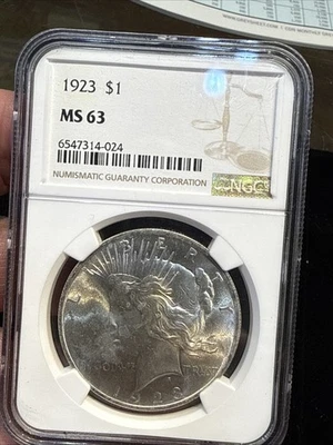 1923-P Philadelphia Mint NGC MS63 Peace Silver Dollar - Image 1 of 4