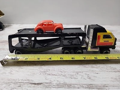 Винтажный игрушечный автопоезд Tonka с красным битлом VW. - Изображение 1 из 4