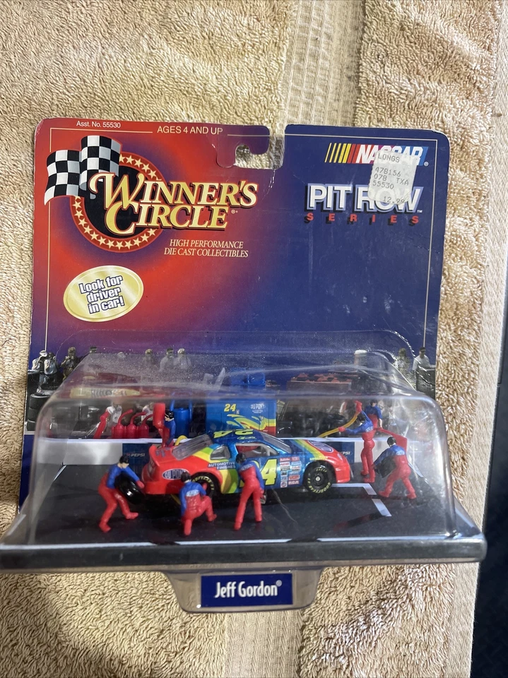 1998 Winners Circle Pit Row Series #24 Jeff Gordon Rainbow Dupont Chevrolet Crew - Image 1 of 1