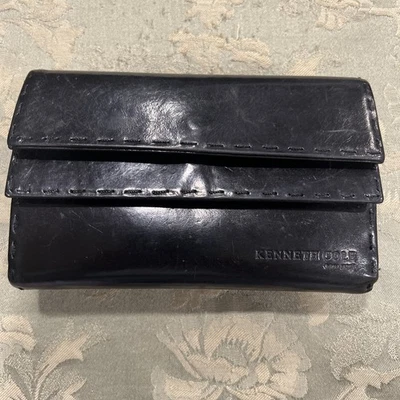 Cartera de cuero negra Reaction Kenneth Cole para mujer usada  Foto 1 de 4