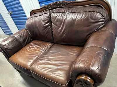 Sofá loveseat marrón oscuro North Shore Signature Ashley Furniture Foto 1 de 4