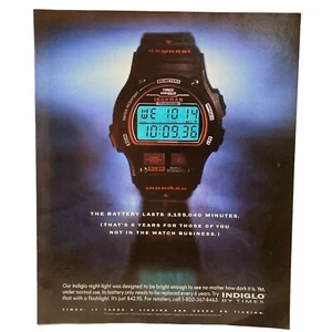 Timex Vintage Watch Print Ad 90s Indiglo Ironman Takes a Licking Keeps Ticking - Picture 1 of 6