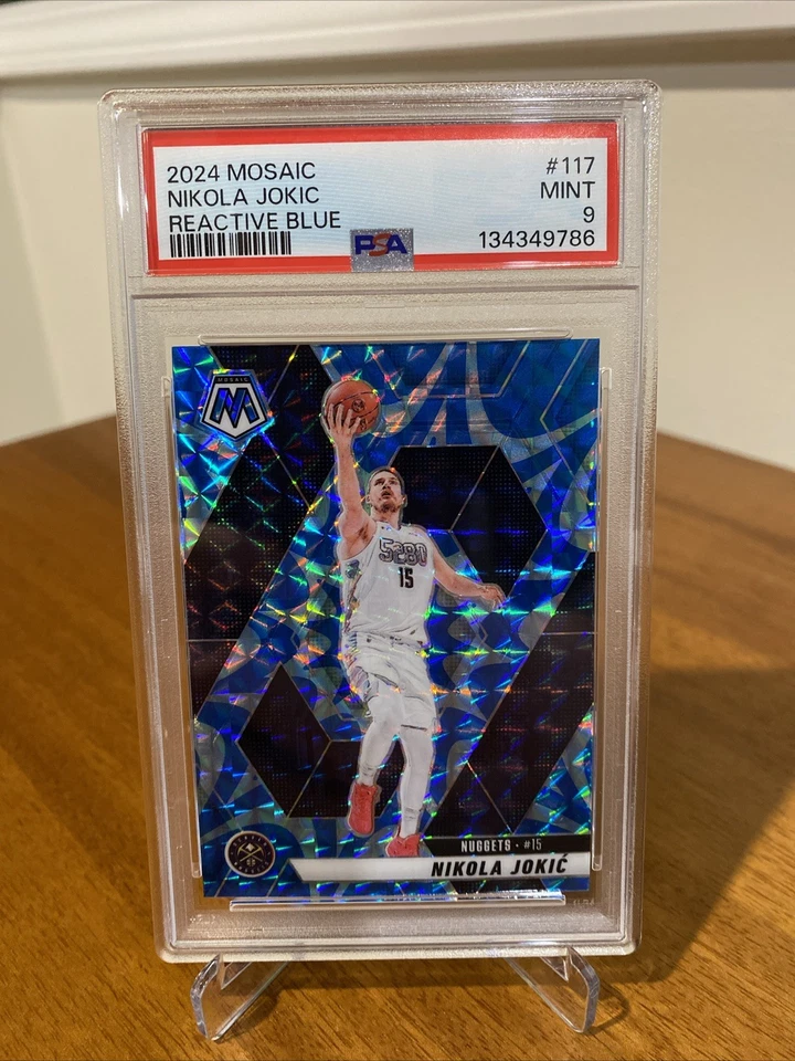 2024-25 Panini Mosaic - Nikola Jokić #117 Reactive Blue Mosaic Prizm PSA 9 - Image 1 of 1