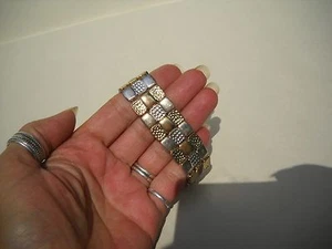 Pulsera elástica ""tejida"" dorada y plateada - Imagen 1 de 3