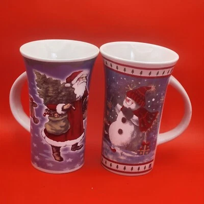 Taza de café con leche navideña de 6" de alto 2 cada una con diseño de Santa y muñeco de nieve Foto 1 de 4