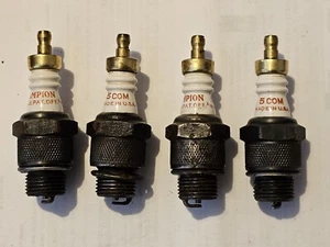 A set of four NOS Champion 5Com (5-Com, 5 Com) vintage spark plugs - Free UK P+P - Picture 1 of 2