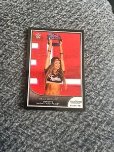 2016 Topps WWE Road to Wrestlemania #38 Nikki Bella Defeats Naomi and Paige - Picture 1 of 2