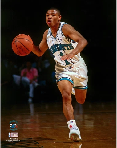 Muggsy Bogues Hornets Unsigned White Jersey Dribbling Up The Court Photograph Cover