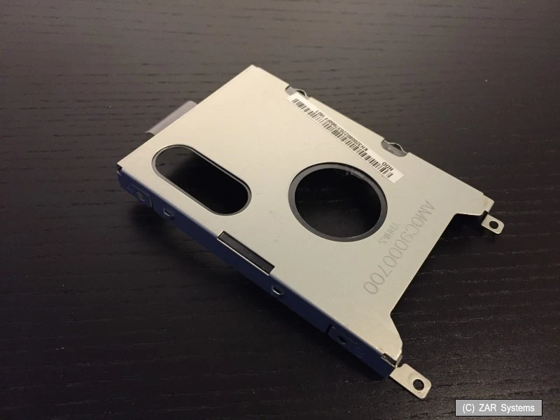 Acer TravelMate 5740 Ersatzteil: Festplatten Halterung HDD Caddy AM0C9000700 - Image 1 of 1