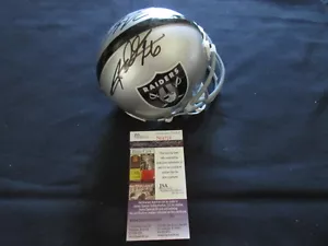 MINI CASCO CHARLES & ROD WOODSON DOBLE FIRMADO OAKLAND RAIDERS RIDDELL JSA CERTIFICADO DE AUTENTICIDAD - Imagen 1 de 5