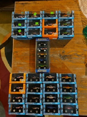 BIGFOOT MONSTER TRUCK 29 PIECE LOT NIB 1:87 SCALE - Image 1 of 4