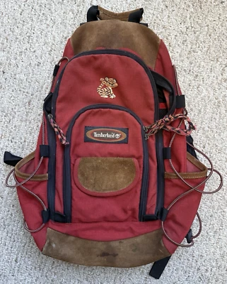 Mochila Timberland Weathergear vintage de lona roja parte inferior de cuero marrón años 90 Foto 1 de 4